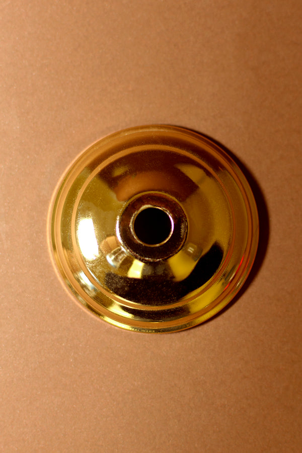 Chapa de hierro con baño latonado