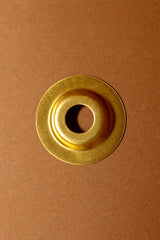 Separador de enfilaje de latón