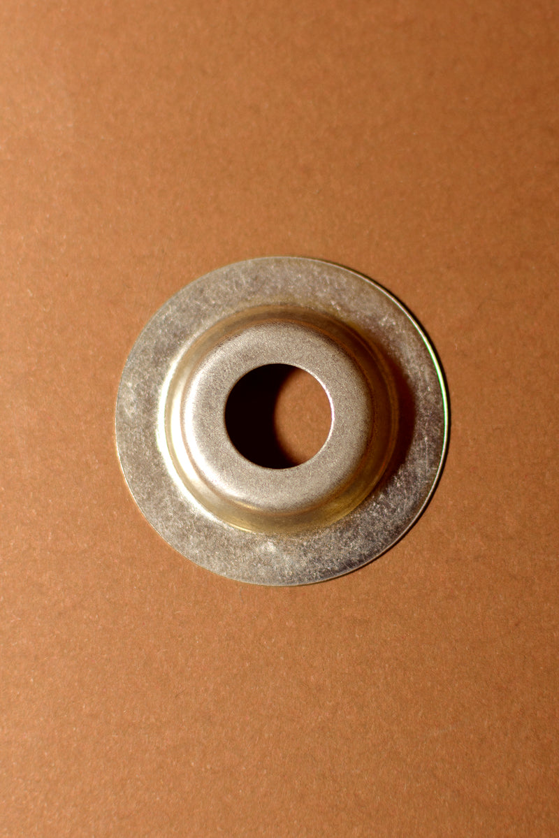 Separador de enfilaje de latón